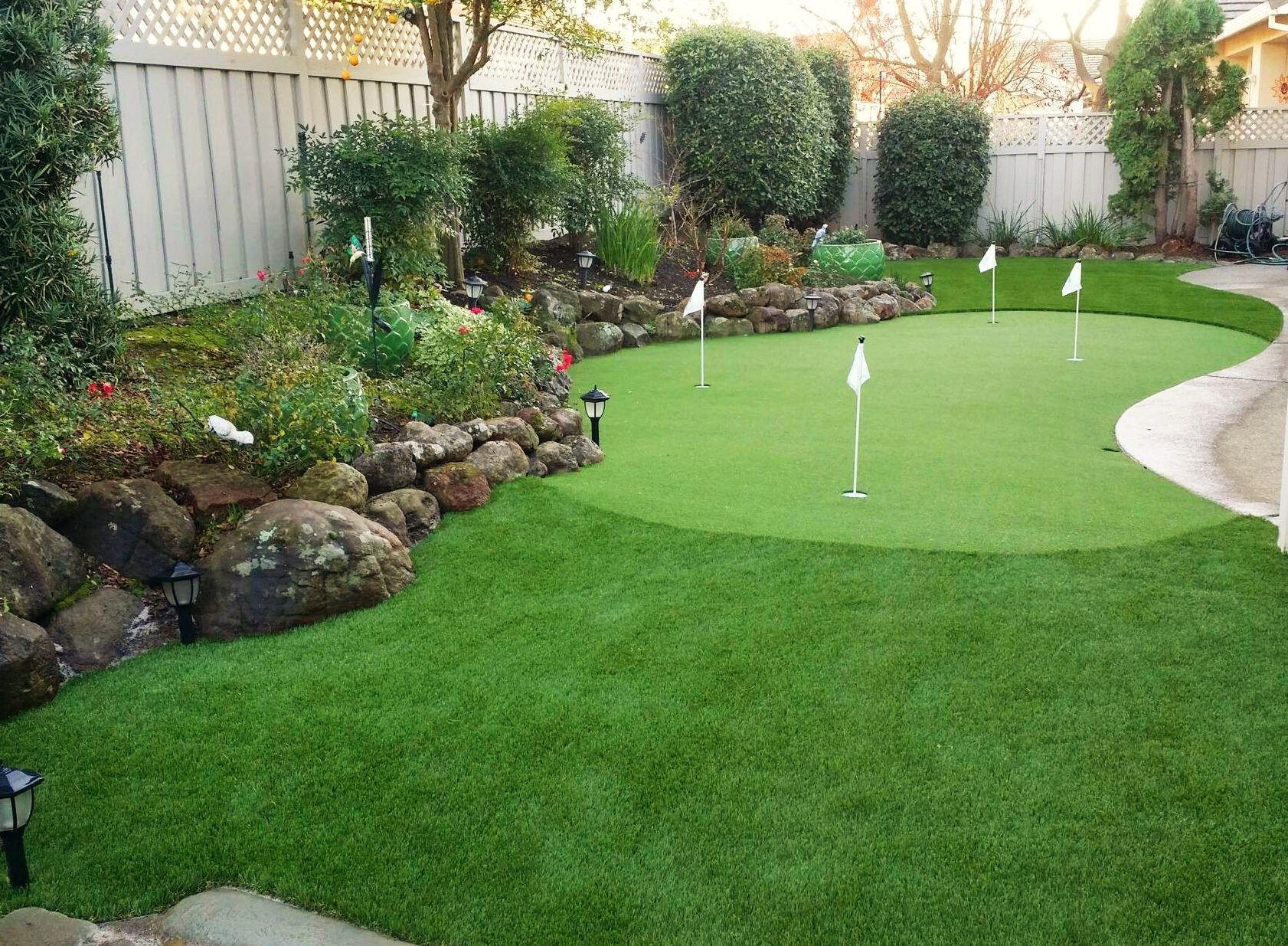 Imagine your very own backyard golf greens. We make it ...