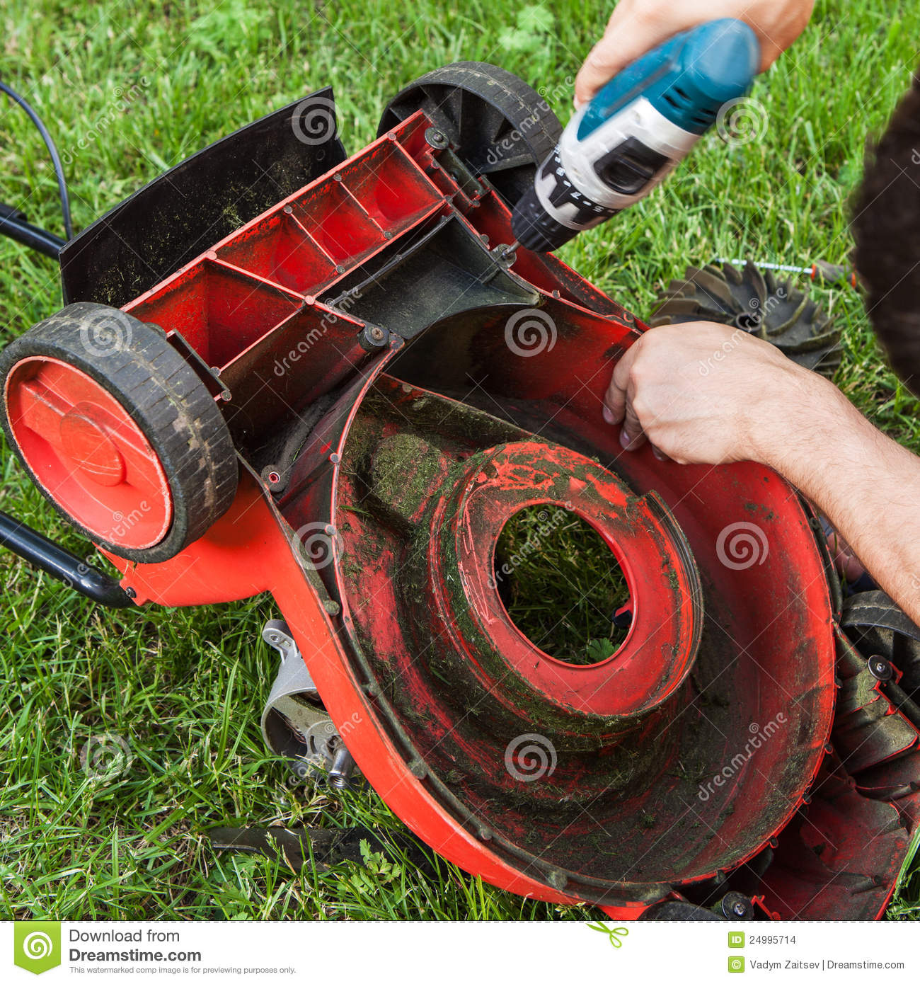 Lawn mower repair stock photo. Image of backyard, grass